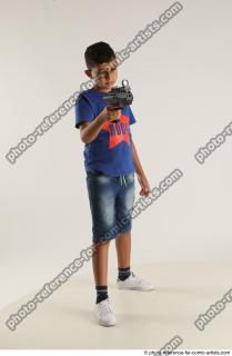 08 2020 01 TIMBO STANDING POSE WITH GUN